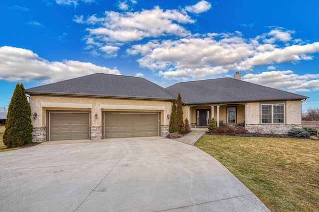 view of front of property with stucco siding, concrete driveway, a garage, stone siding, and a front lawn