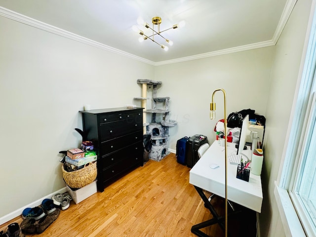 office space featuring an inviting chandelier, crown molding, baseboards, and wood finished floors