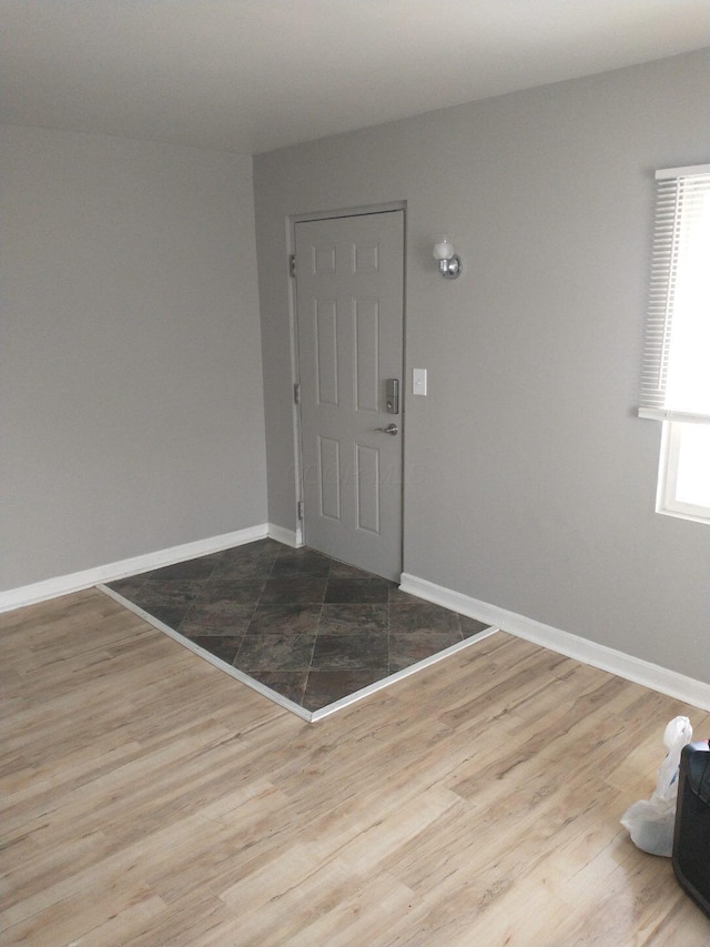 74 W Moler St, Columbus, OH 43207 - foyer entrance with baseboards and wood finished floors