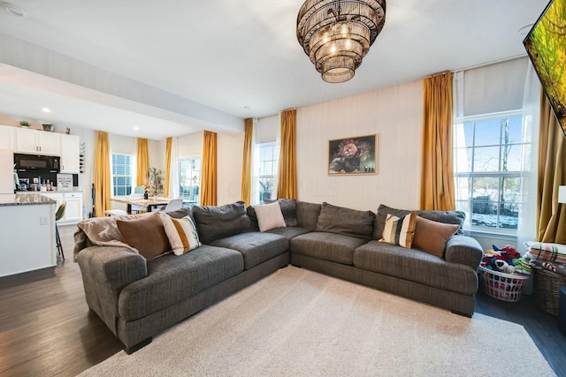 living room featuring wood finished floors and recessed lighting