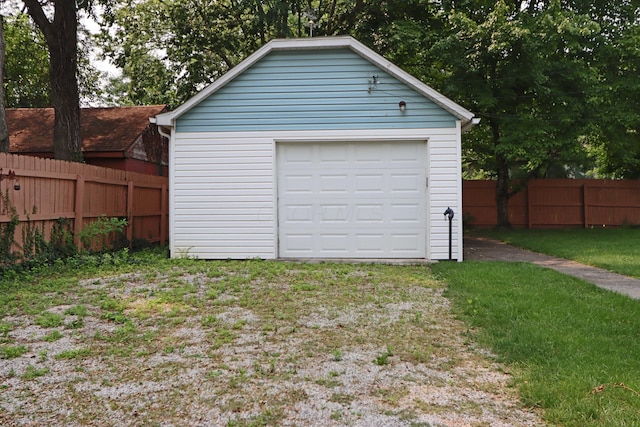 garage with fence