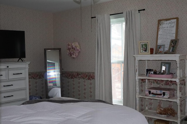 bedroom featuring wallpapered walls