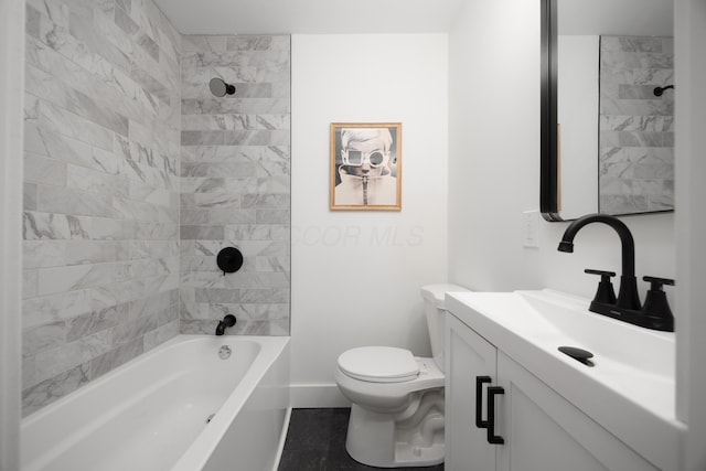 bathroom with shower / bathing tub combination, vanity, toilet, and baseboards