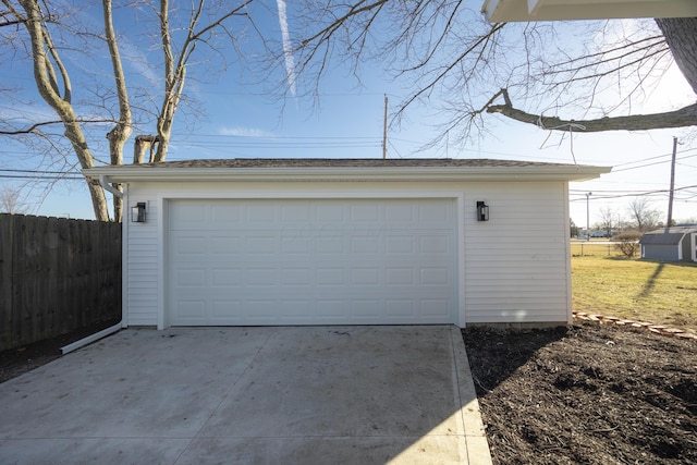 detached garage with fence