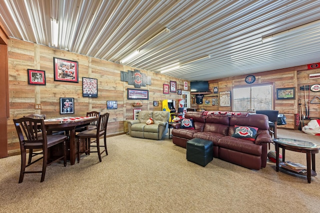 living area featuring carpet floors and metal wall