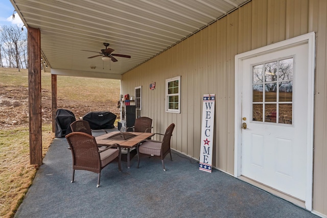 view of patio / terrace featuring ceiling fan, outdoor dining area, and area for grilling