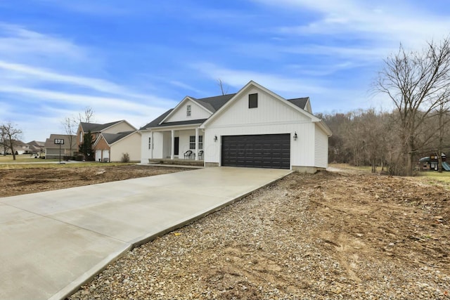 modern farmhouse with a garage and concrete driveway