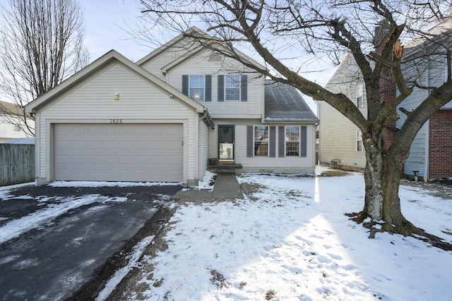 traditional-style house featuring a garage