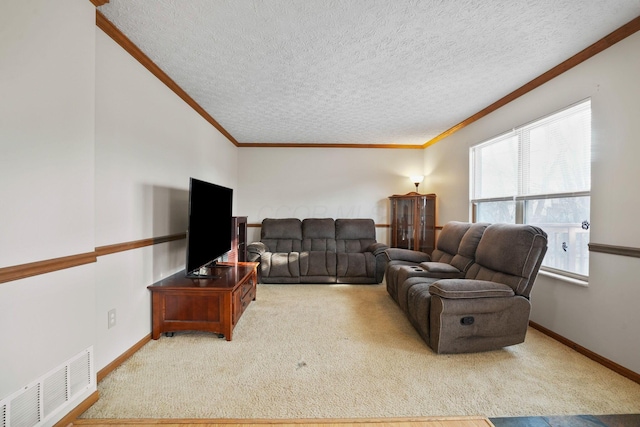 living area featuring carpet floors, baseboards, visible vents, and crown molding