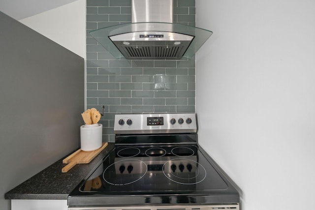 kitchen featuring backsplash, extractor fan, and electric stove