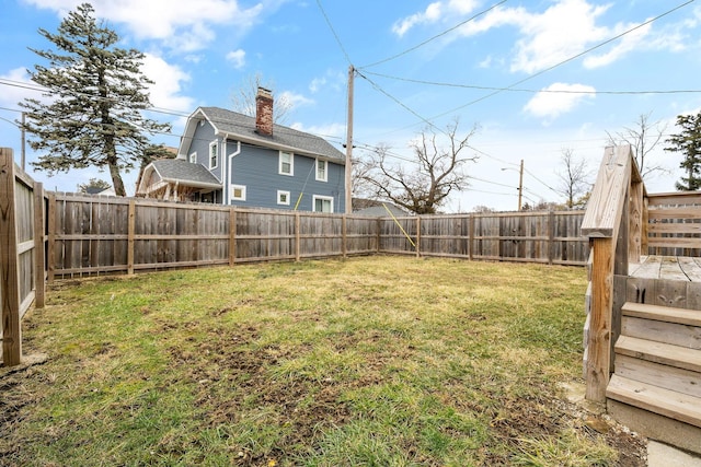 view of yard featuring a fenced backyard