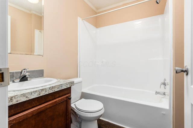 full bath with ornamental molding,  shower combination, vanity, and toilet