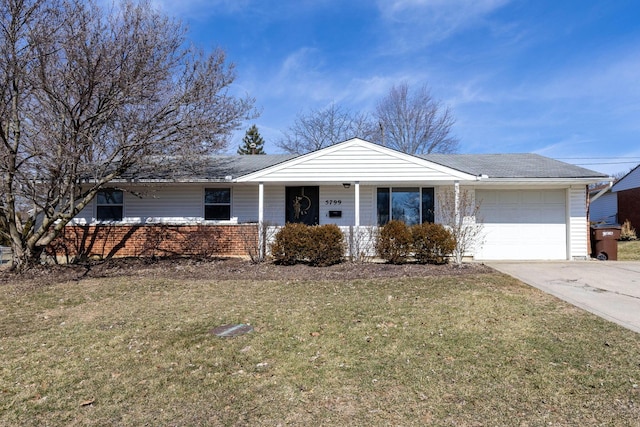 ranch-style home with a front yard, brick siding, driveway, and an attached garage