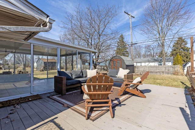 deck with fence and an outdoor living space