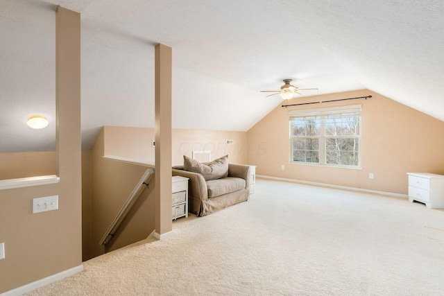 bonus room featuring carpet floors, baseboards, and lofted ceiling