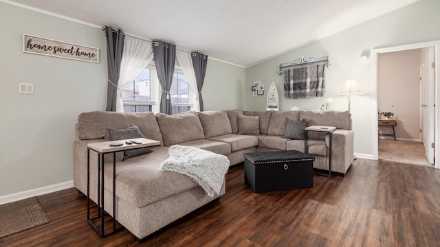 living room featuring lofted ceiling, baseboards, and wood finished floors