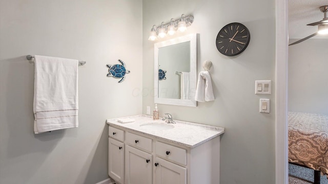 ensuite bathroom with ensuite bath and vanity