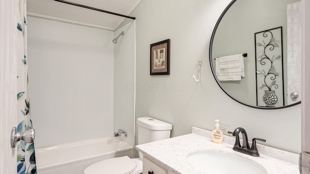 full bath featuring shower / bathtub combination, a textured ceiling, vanity, and toilet