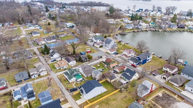 aerial view with a residential view and a water view