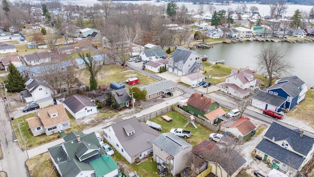 aerial view featuring a water view and a residential view