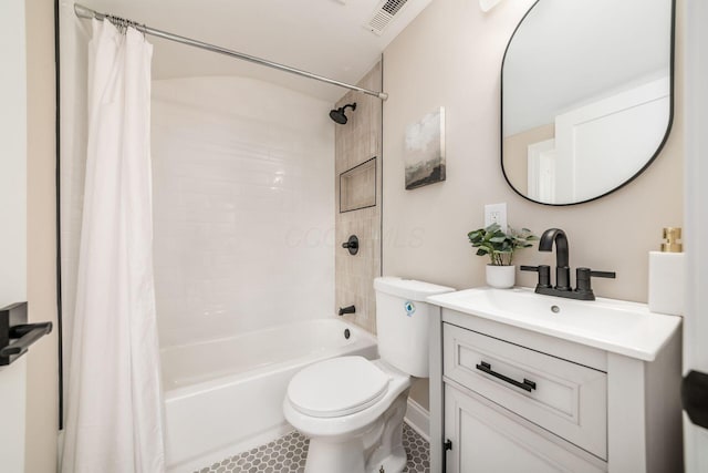 full bathroom featuring visible vents, toilet, shower / tub combo with curtain, tile patterned flooring, and vanity