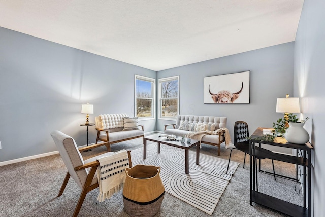 living room featuring carpet floors and baseboards