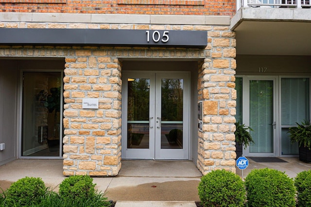 105 N Riverview St Unit 216, Dublin, OH 43017 - doorway to property featuring french doors and brick siding