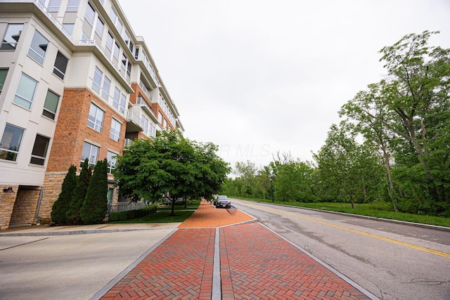 105 N Riverview St Unit 216, Dublin, OH 43017 - view of asphalt road with curbs