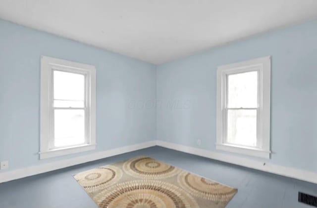 spare room with visible vents