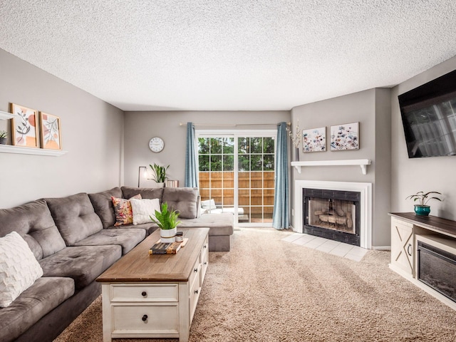 5610 Barney Ln Unit 41F, Columbus, OH 43235 - carpeted living area featuring a fireplace with flush hearth and a textured ceiling
