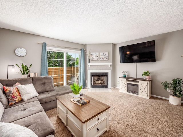 5610 Barney Ln Unit 41F, Columbus, OH 43235 - carpeted living room featuring a fireplace with flush hearth, a textured ceiling, and baseboards