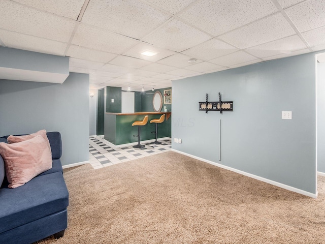 5610 Barney Ln Unit 41F, Columbus, OH 43235 - sitting room with carpet flooring, a paneled ceiling, baseboards, and a dry bar