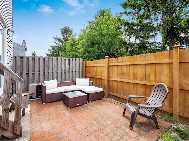 5610 Barney Ln Unit 41F, Columbus, OH 43235 - view of patio with an outdoor living space and a fenced backyard