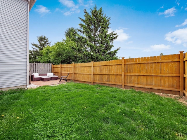 5610 Barney Ln Unit 41F, Columbus, OH 43235 - view of yard with a patio area and an outdoor living space