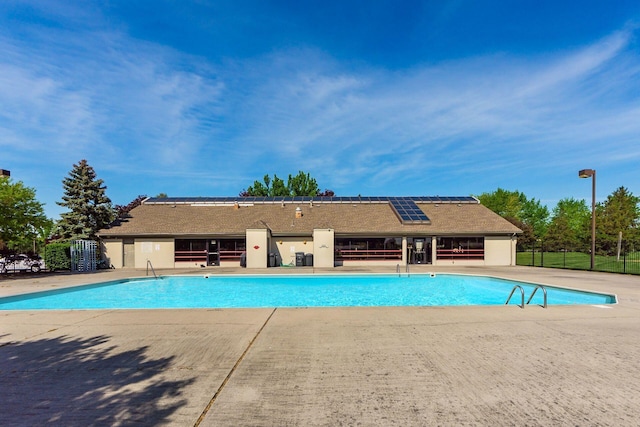 5610 Barney Ln Unit 41F, Columbus, OH 43235 - community pool featuring fence and a patio area