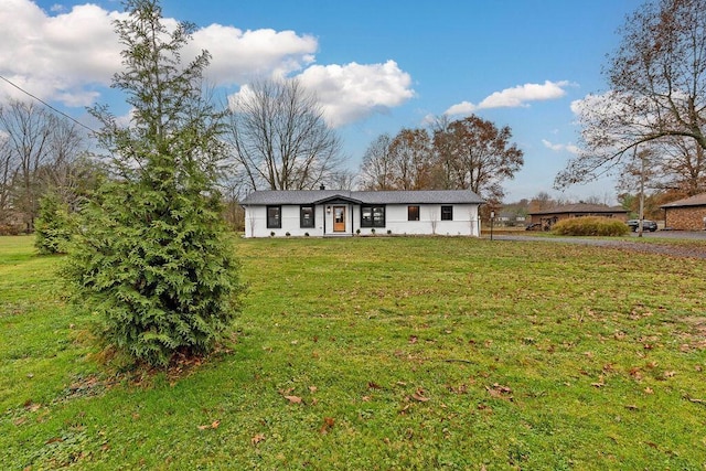 view of front of home with a front yard