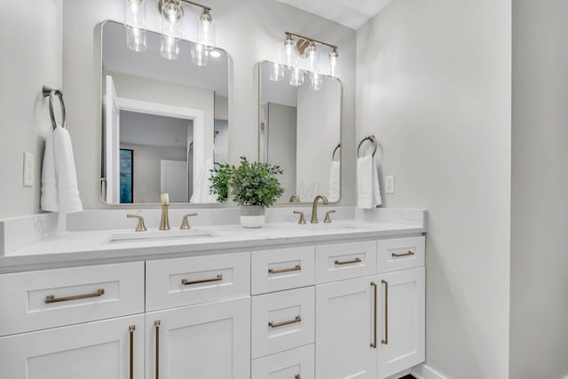 bathroom featuring double vanity and a sink