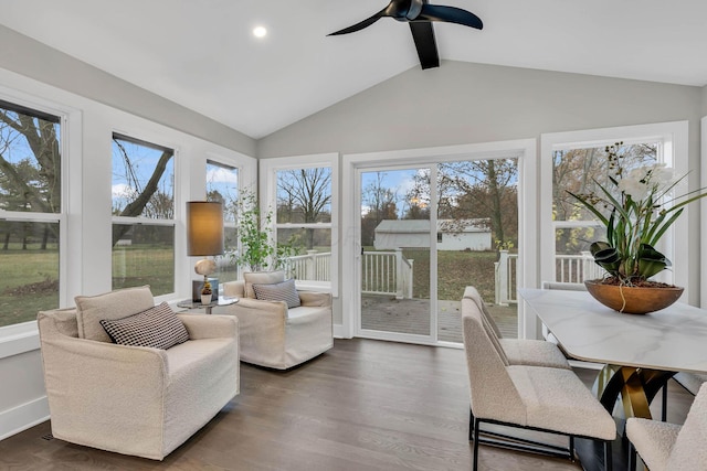 sunroom / solarium with lofted ceiling with beams