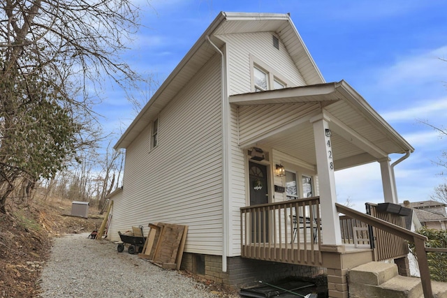 view of home's exterior with covered porch