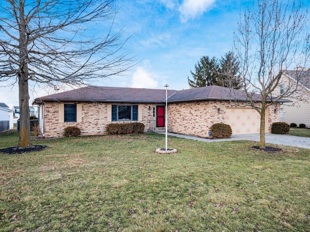 ranch-style home with a garage, concrete driveway, brick siding, and a front yard