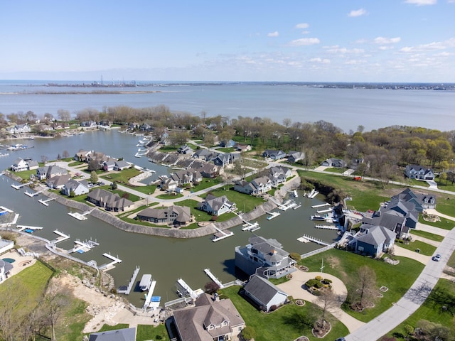 aerial view with a residential view and a water view