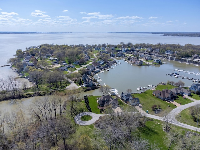 birds eye view of property featuring a residential view and a water view