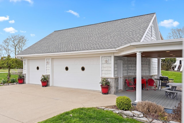 garage featuring driveway