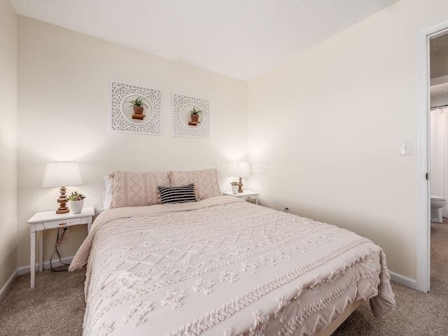 bedroom featuring baseboards and carpet flooring