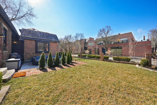 view of yard with a patio and fence