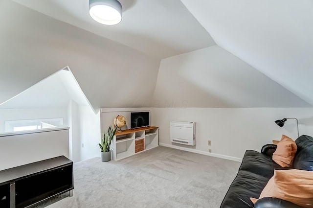 additional living space with lofted ceiling, carpet flooring, and baseboards