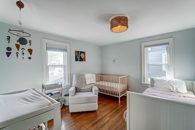 bedroom featuring wood finished floors