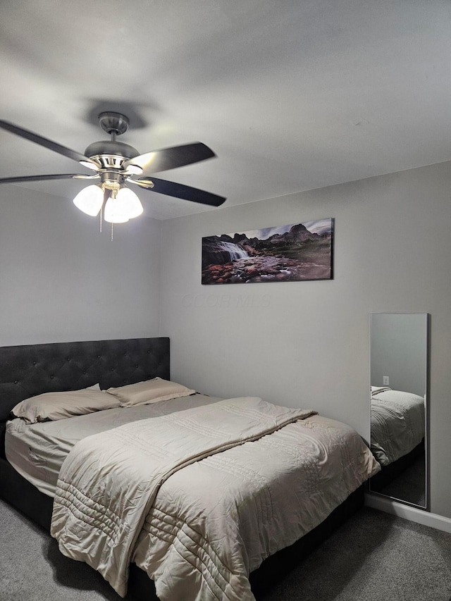 carpeted bedroom with a ceiling fan