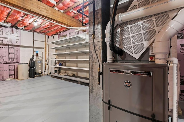 unfinished basement featuring heating unit