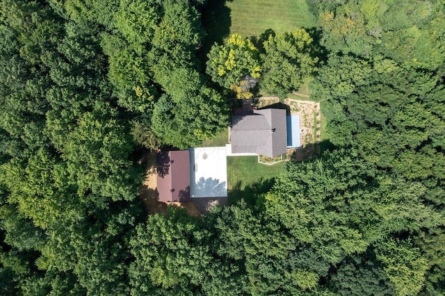 bird's eye view featuring a view of trees